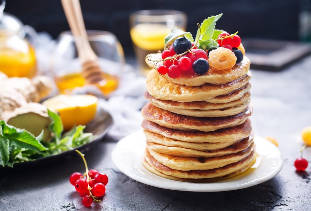 pancakes with syrup and fruit
