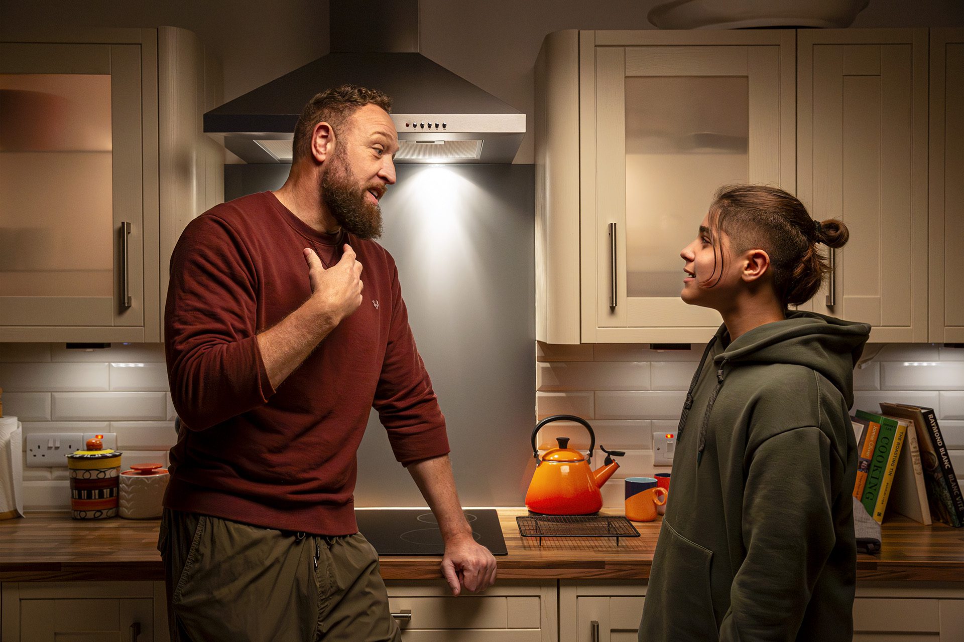 Man and boy in kitchen
